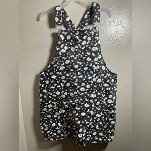 Black daisy patterned overall dress